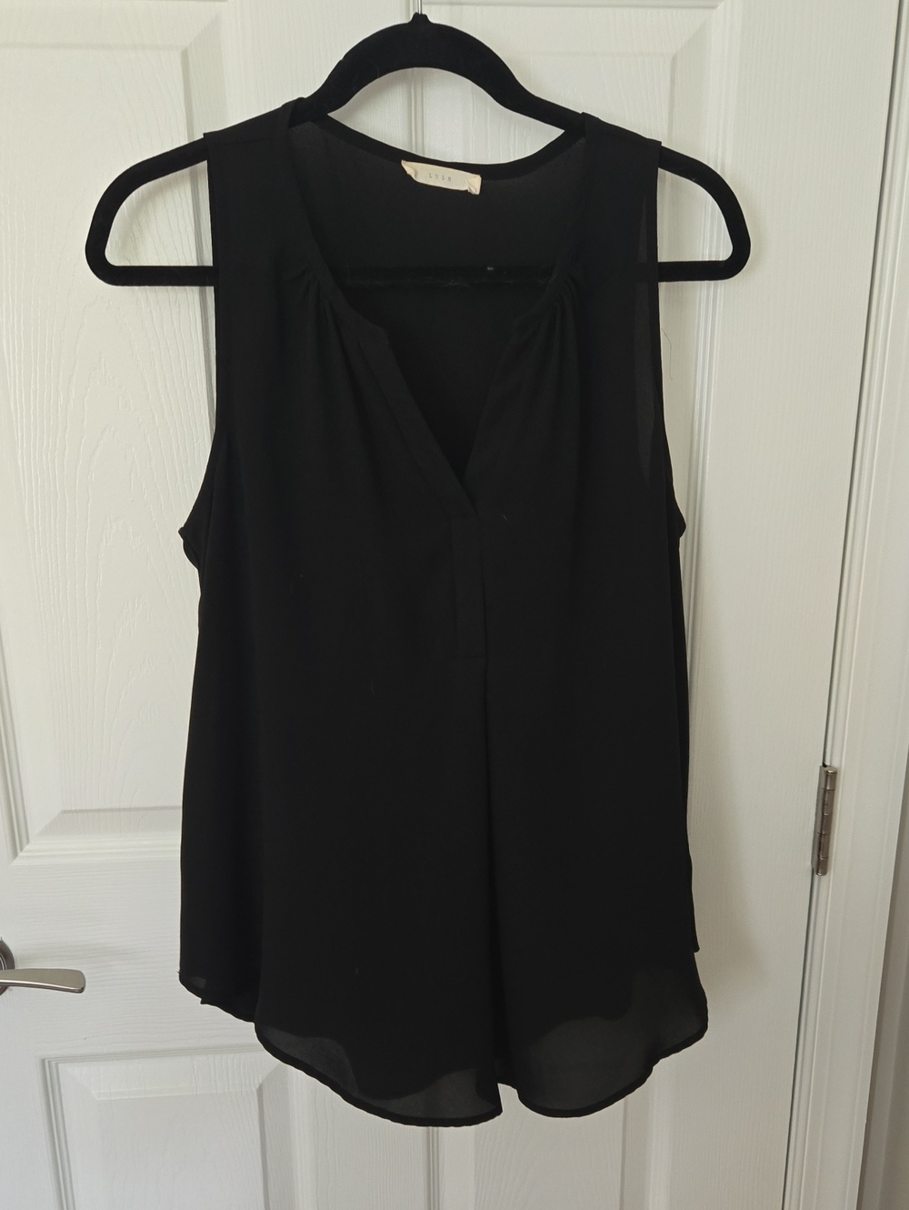 Black Sleeveless V-Neck Blouse by Lush